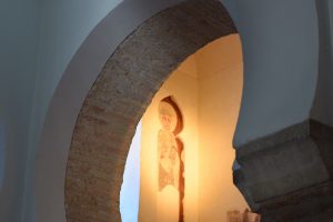 Christian iconography viewed through an Arabic style arch in La Mezquita Del Cristo de La Luz