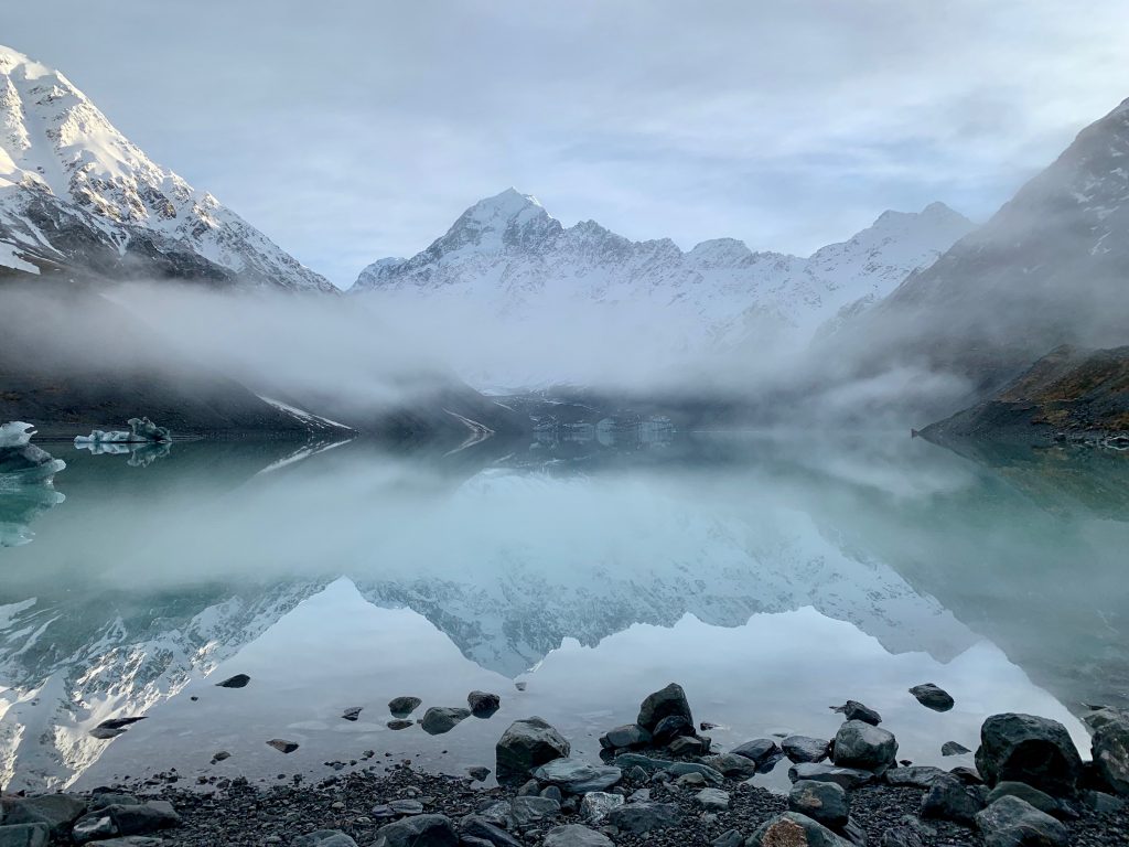 Mount Cook reflected in the glacier lake at the end of the Hooker Track.