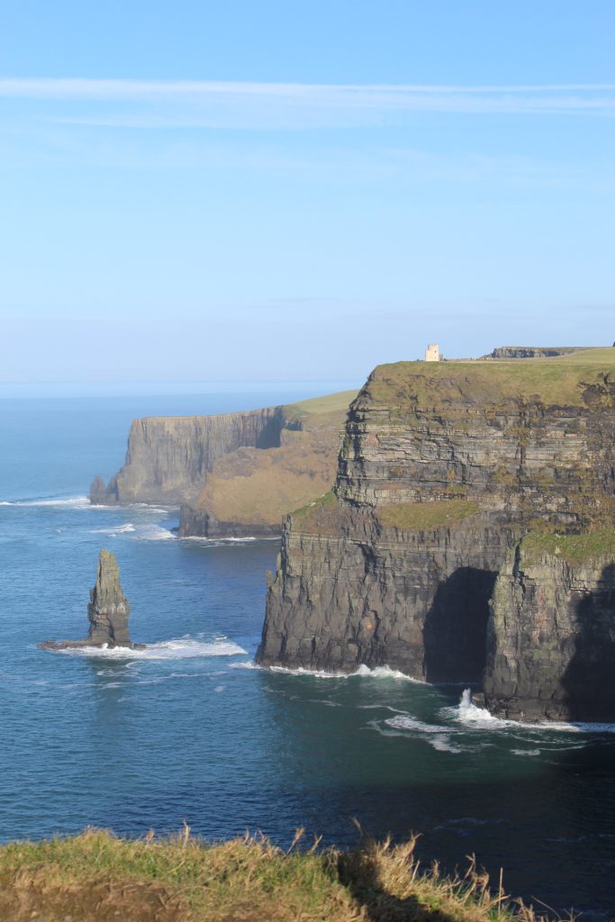 Cliffs and ocean. You can just make out Obrien's tower, and older white building, on the top of the cliff.