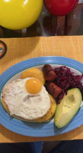 Typical breakfast:  egg on toast, avocado, berries