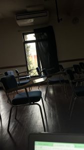 pictured are desks in a classroom