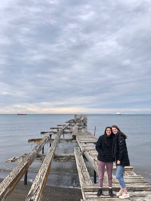 Izzy and I on a dock facing Antarctica