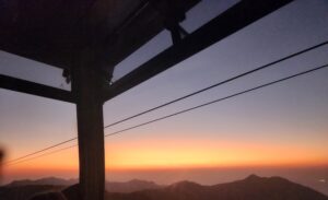 Partial view of the 360-degree view of the sunset from the cable car on the ride back from the buddha. 
