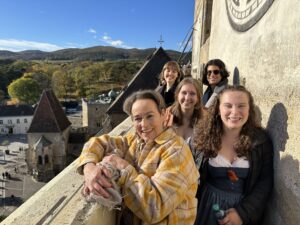 The Linfield gang (Sage, Rachel, Andrew, and Lizzie) and Ingrid beam for the camera at the top of the bell tower in Perchtoldsdorf