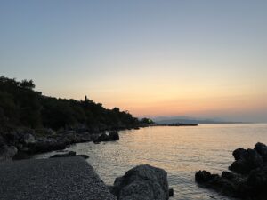 A photo of the sunrise looking out of Nissaki bay, Corfu, Greece. 