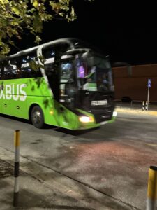 A blurry photo of the Flixbus arriving at the bus stop where Lizzie and Sage got on. 
