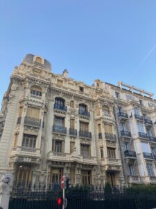 Image of a building in Nice with terraces and intricate French details.