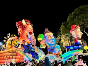 Float from the parade of lights. The theme is video games with Super Mario characters who have heads of various other people.