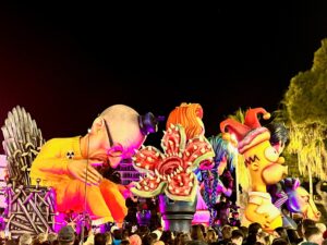 Float at the parade of lights with a TV show theme. There is a Stranger Things monster, Homer Simpson, Walter White sitting on the Game of Thrones chair, etc. 