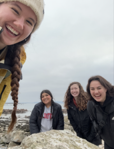 Smiling picture of all four roommates on an adventure.