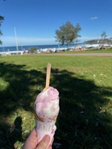 cone of gelato on beach