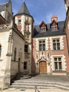 Château du Clos Lucé, the château given to Leonardo da Vinci by François I. It is a châtuea of brick with white stone accents.