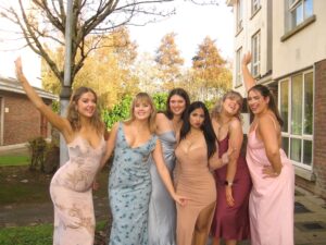 Six girls in long dresses