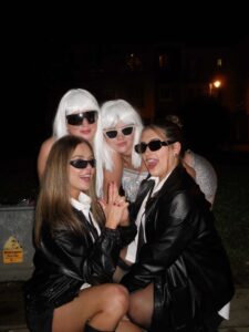 Four students dressed up in costumes