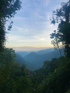 The view of a sunrise coming over the Mindo valley.