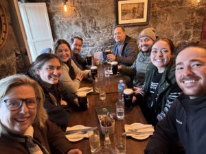 A family sitting at a table at lunch