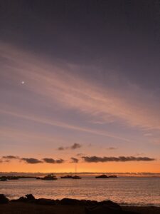 A sunset at Playa Mann on San Cristóbal, Galápagos.