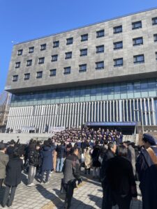 Yonsei Business students taking their picture for graduation