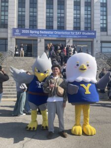 Photo with the Yonsei mascots before orientation