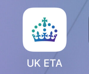 The icon for the ETA app consisting of a purple, blue, and green crown