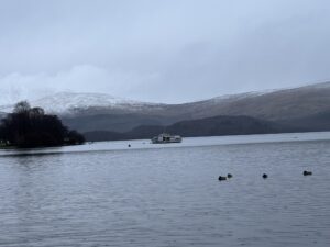 Loch Lomond with a boat and several ducks