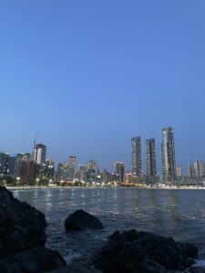City of Busan at Night with dark blue sky overlooking tall skyscapers.