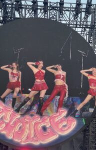 Big video screen showing the performance of popular girl group "TWICE"